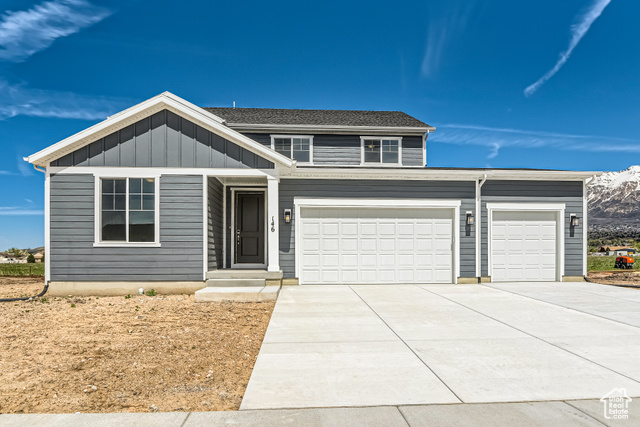 146 East Montgomery Lane, Unit 6 Harrisville, UT 84414 - Photo 1 of 1 Front of Home with 3-Bay Garage and Craftsman Exterior