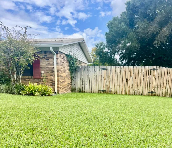 a view of a backyard with a garden