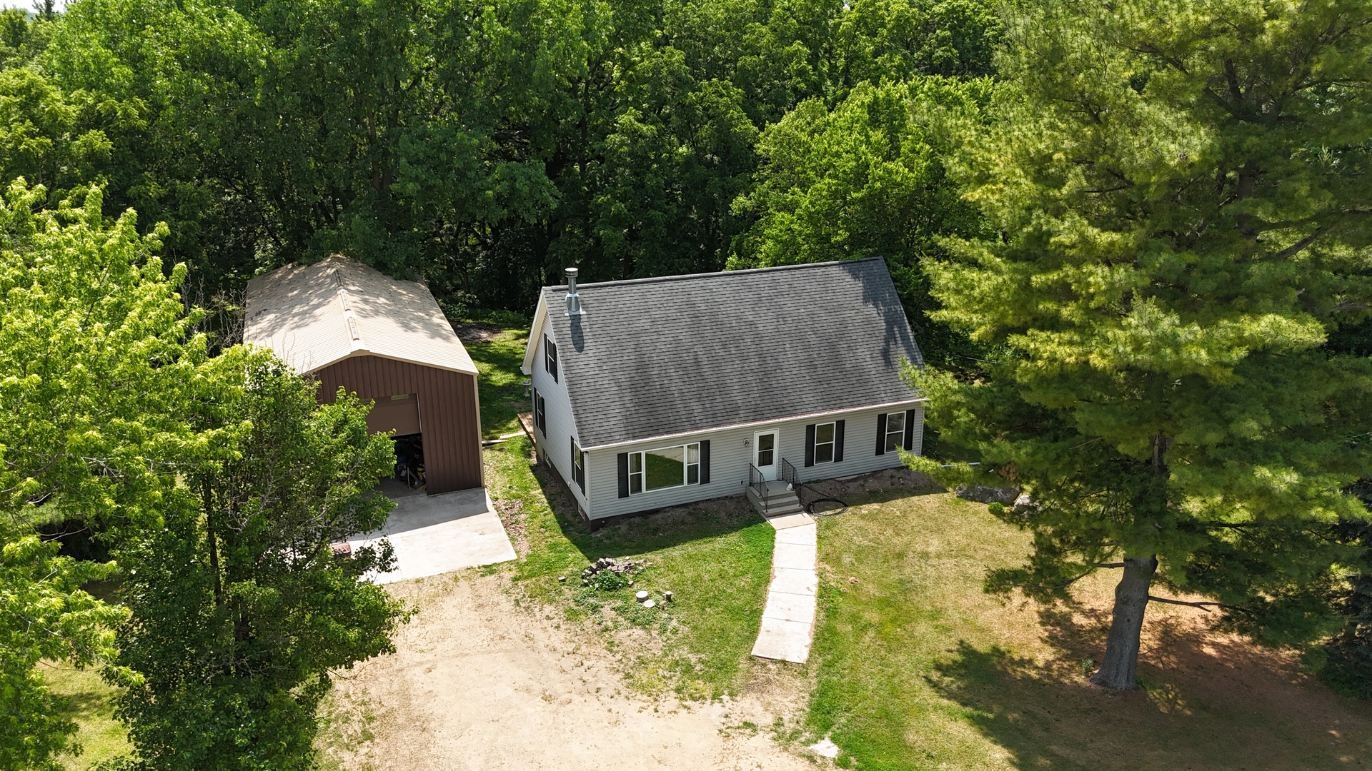 32597 Genoa Road Genoa, IL 60135 - Photo 2 of 31 an aerial view of a house with a yard