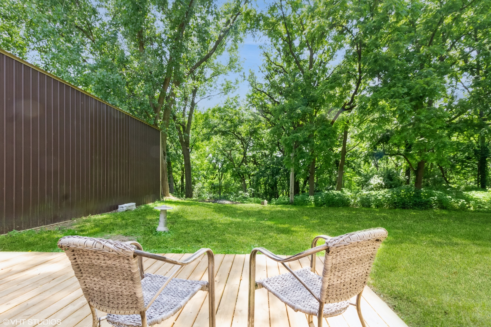 32597 Genoa Road Genoa, IL 60135 - Photo 21 of 31 a view of a table and chairs in backyard