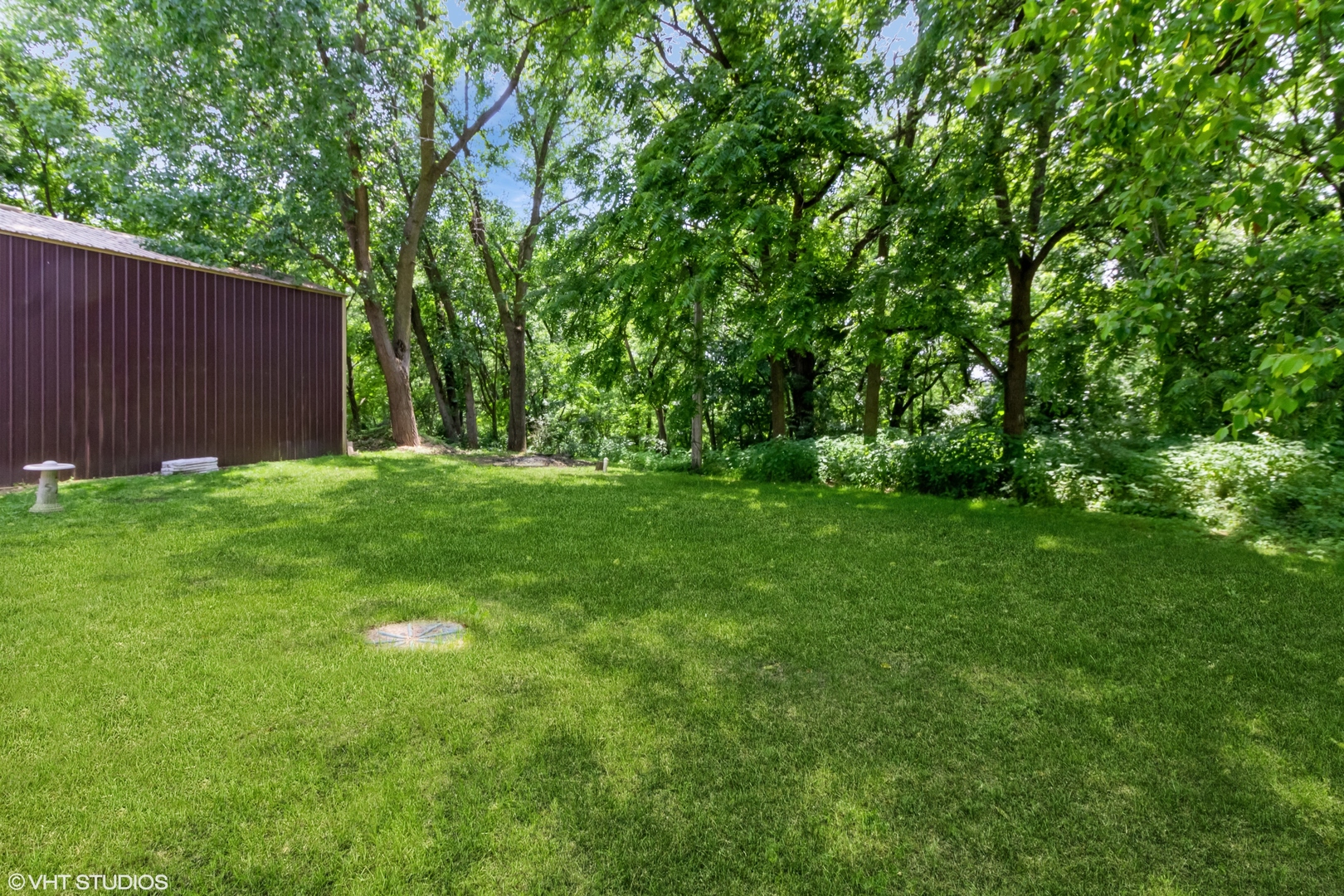 32597 Genoa Road Genoa, IL 60135 - Photo 24 of 31 a view of a backyard with a garden