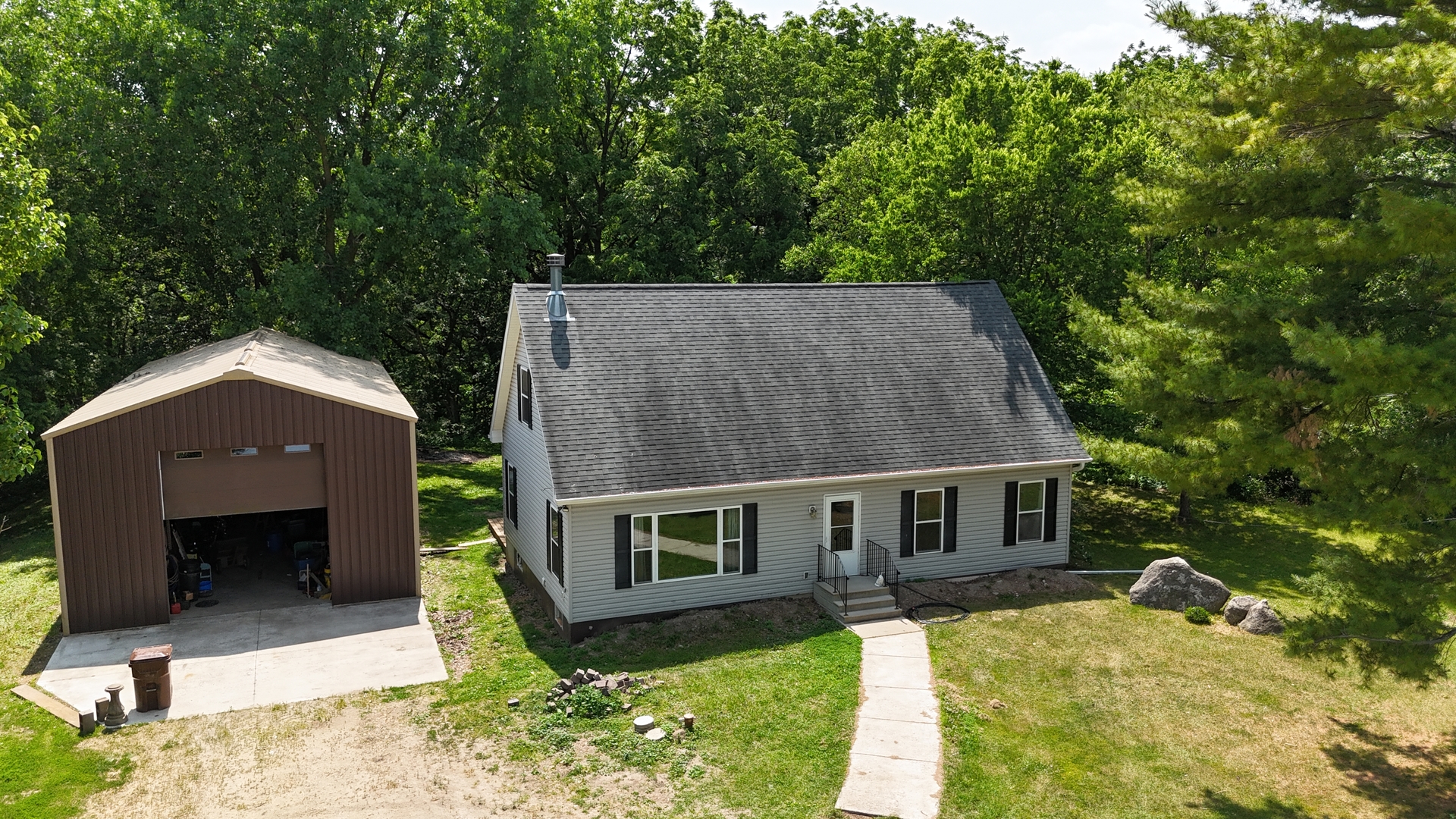 32597 Genoa Road Genoa, IL 60135 - Photo 28 of 31 front view of house with a yard