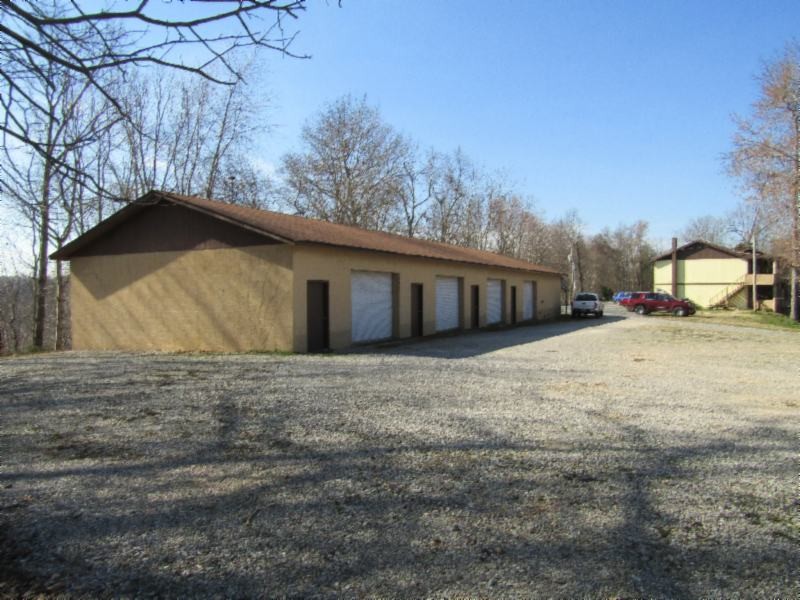 182 Ridge View Lane Baxter, TN 38544 - Photo 21 of 26 a tall tree in front of a house