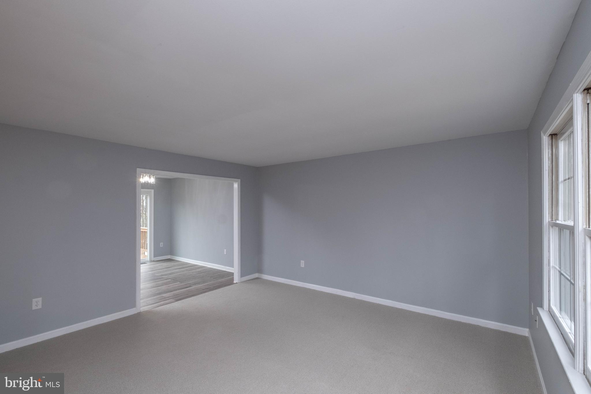 4249 Freezeland Road Linden, VA 22642 - Photo 16 of 54 Great room looking into kitchen/dining area.