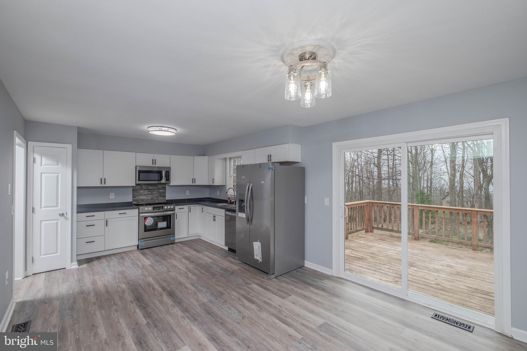 4249 Freezeland Road Linden, VA 22642 - Photo 18 of 54 Enormous kitchen/dining area w/ deck access!