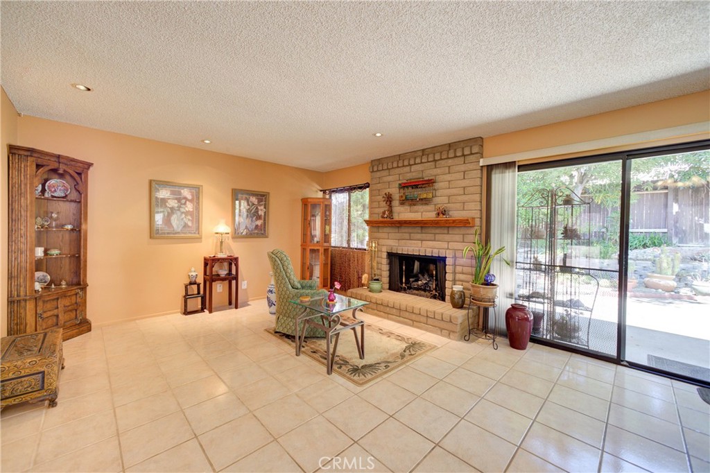 4185 Vanguard Drive Lompoc, CA 93436 - Photo 11 of 44 a bedroom with furniture and a fireplace
