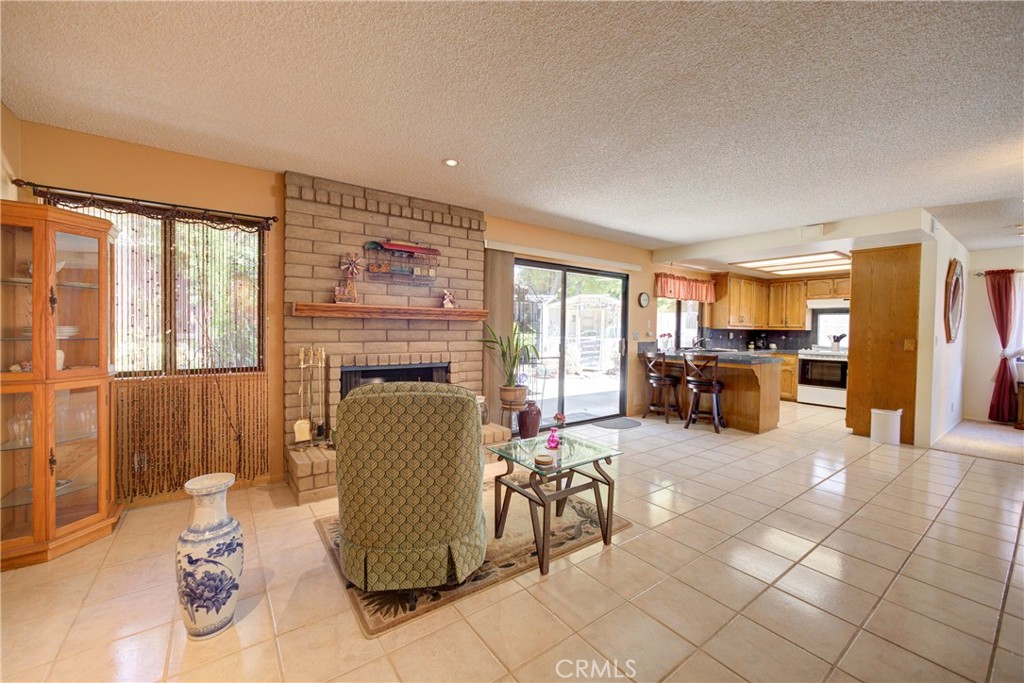 4185 Vanguard Drive Lompoc, CA 93436 - Photo 13 of 44 a living room with furniture and a fireplace