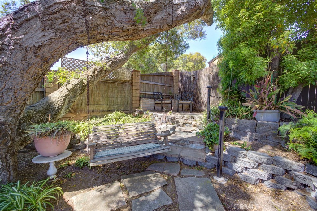 4185 Vanguard Drive Lompoc, CA 93436 - Photo 41 of 44 a garden view with a seating space