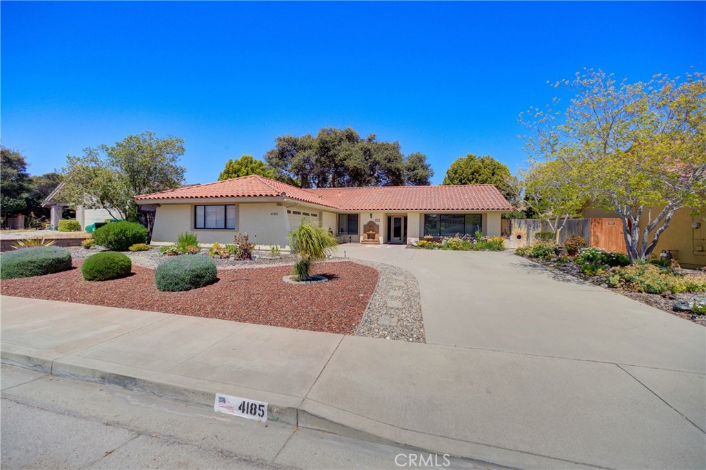 4185 Vanguard Drive Lompoc, CA 93436 - Photo 43 of 44 a front view of a building with small garden