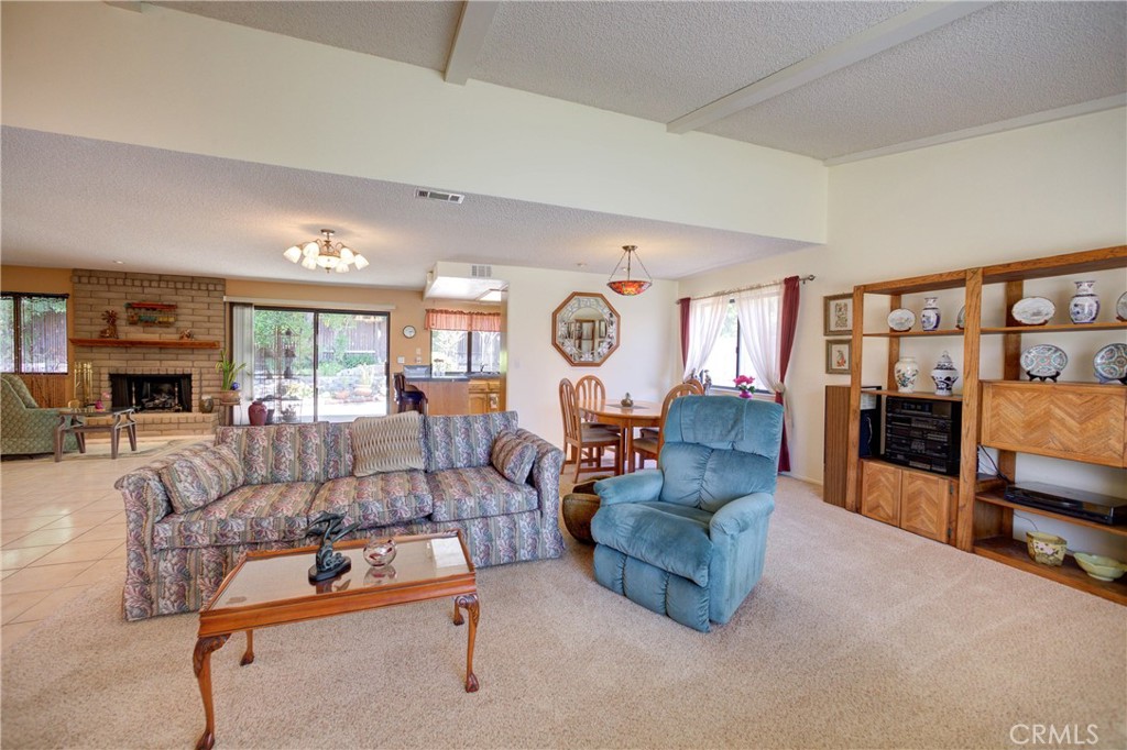 4185 Vanguard Drive Lompoc, CA 93436 - Photo 8 of 44 a living room with furniture and a flat screen tv