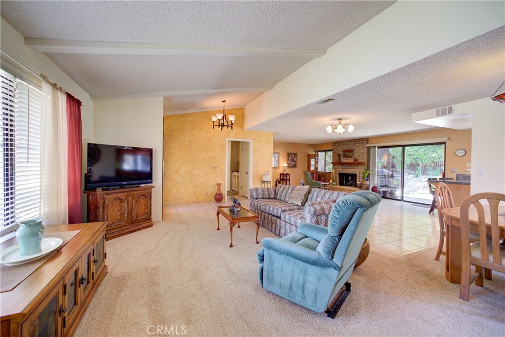 4185 Vanguard Drive Lompoc, CA 93436 - Photo 9 of 44 a living room with furniture and a flat screen tv