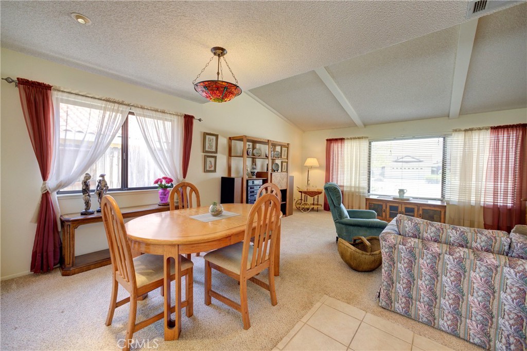 4185 Vanguard Drive Lompoc, CA 93436 - Photo 10 of 44 a view of a dining room with furniture window and outside view