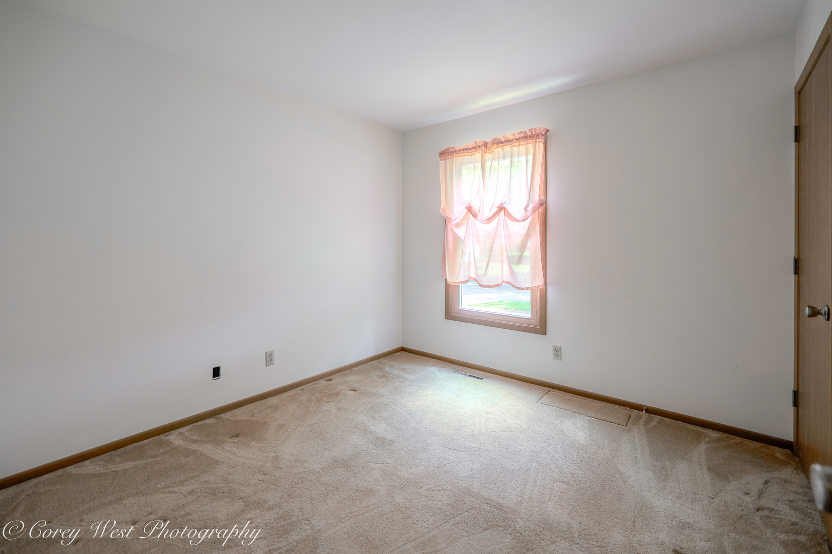 335 South Hadsall Street Genoa, IL 60135 - Photo 14 of 23 an empty room with windows
