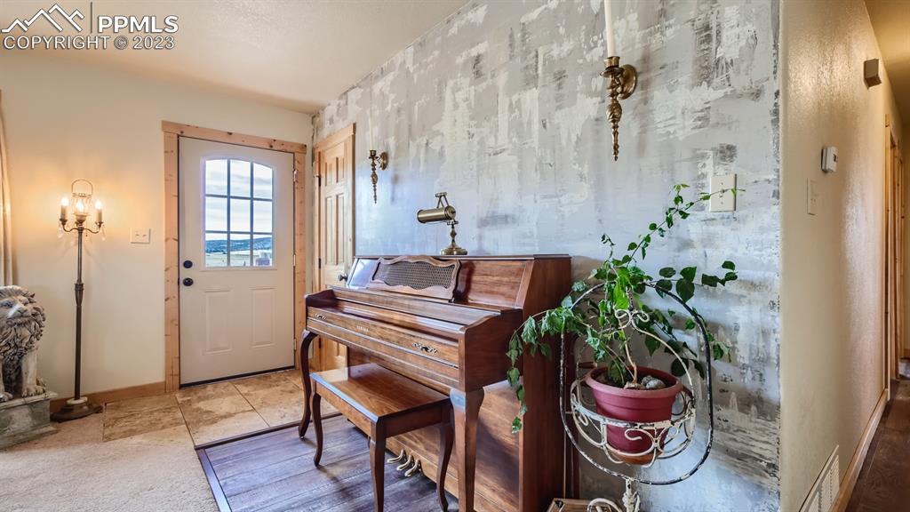 29 Ridge Point Circle Divide, CO 80814 - Photo 14 of 50 a dining room with a table and chairs