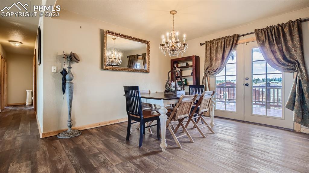 29 Ridge Point Circle Divide, CO 80814 - Photo 22 of 50 a view of a dining room with furniture window and wooden floor