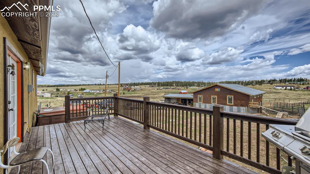 29 Ridge Point Circle Divide, CO 80814 - Photo 47 of 50 a view of a balcony with wooden floor