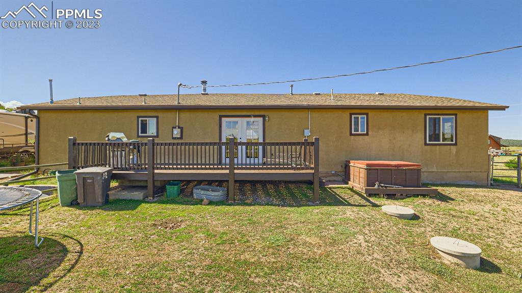29 Ridge Point Circle Divide, CO 80814 - Photo 48 of 50 a backyard of a house with yard and outdoor seating