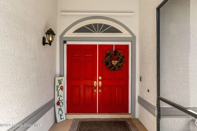 a front view of a house with swimming pool