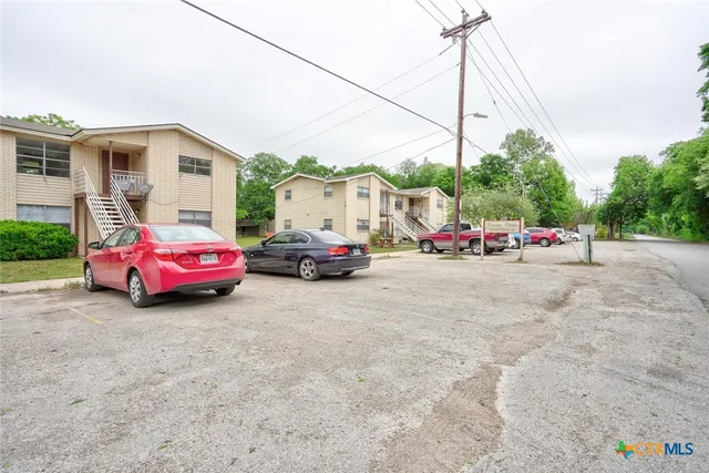 a car parked in front of a house