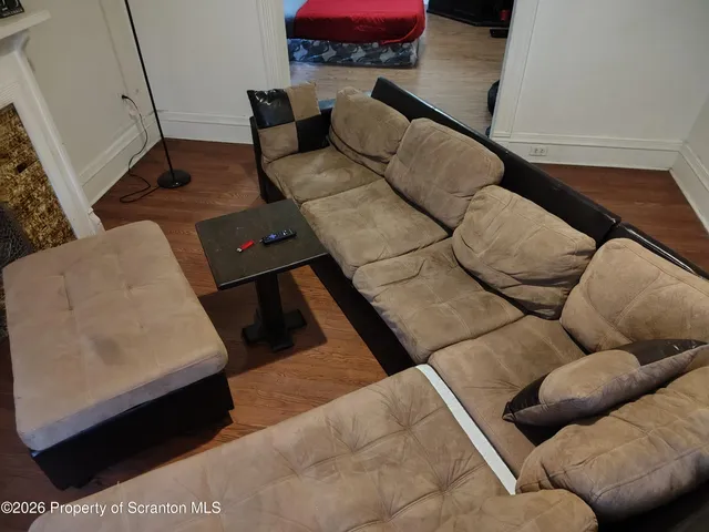 a living room with furniture and a couch