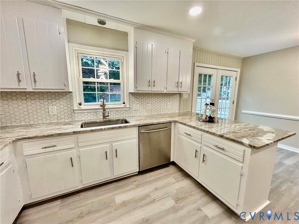 7110 Manning Road Chesterfield, VA 23832 - Photo 24 of 50 White cabinetry with brushed nickel hardware, ston