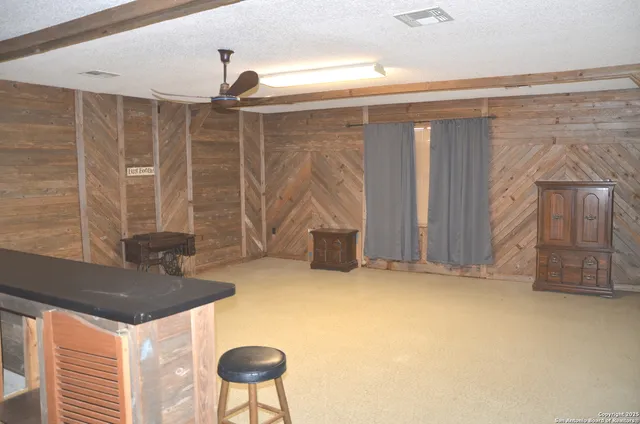 a bathroom with a sink and a shower