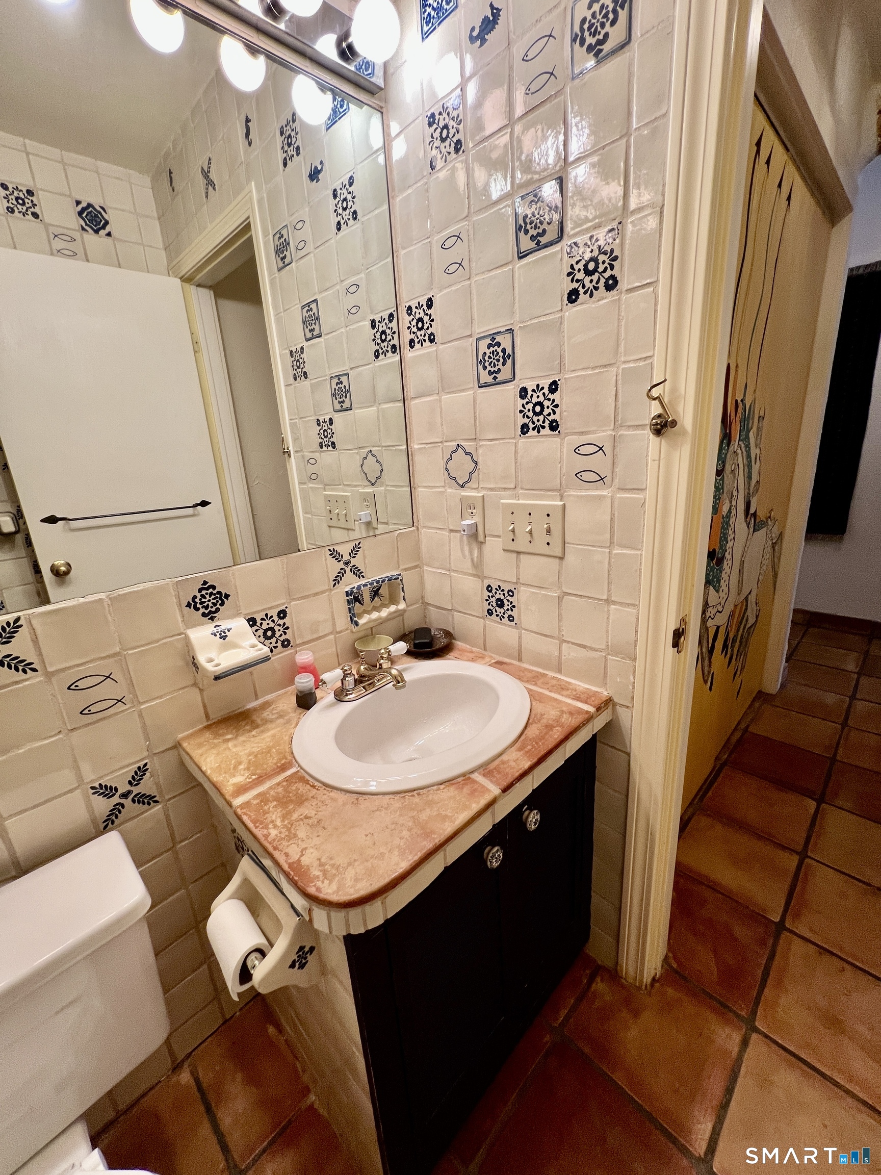 290 Cliffside Drive Torrington, CT 06790 - Photo 17 of 40 a bathroom with a sink and a mirror