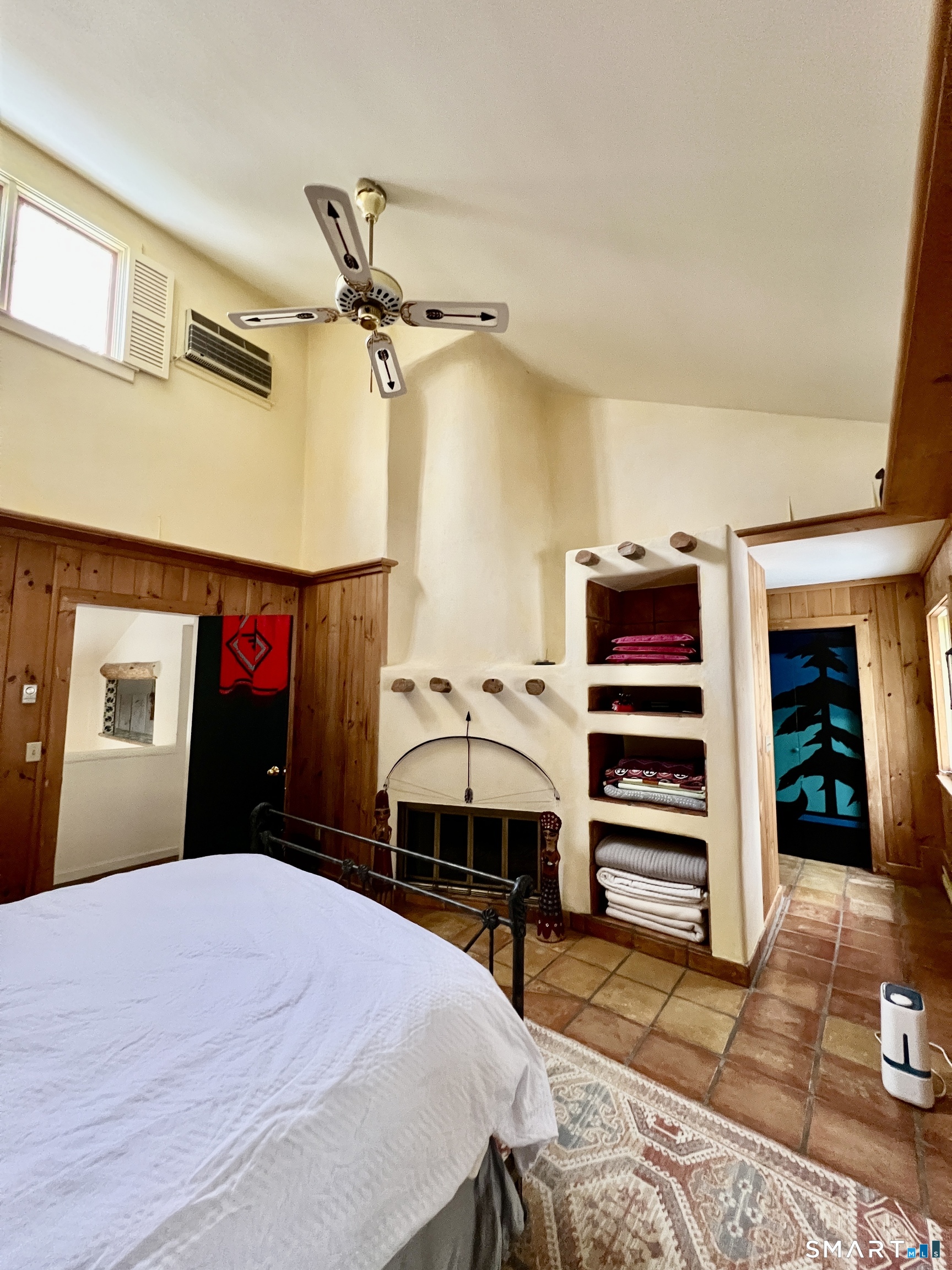 290 Cliffside Drive Torrington, CT 06790 - Photo 21 of 40 a bedroom with a bed and a chandelier