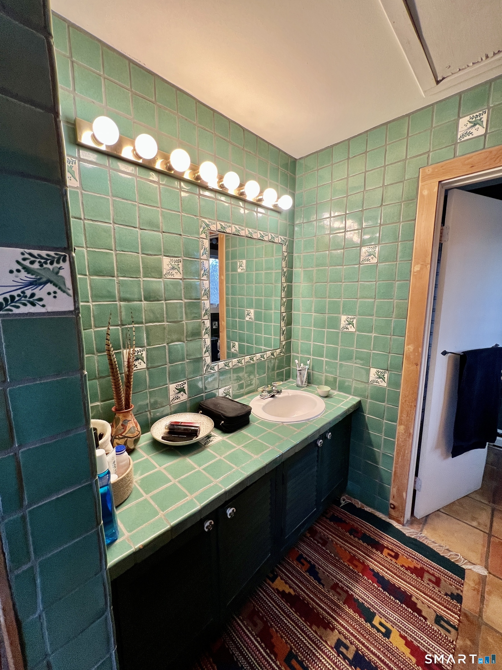 290 Cliffside Drive Torrington, CT 06790 - Photo 27 of 40 a bathroom with a sink and a mirror