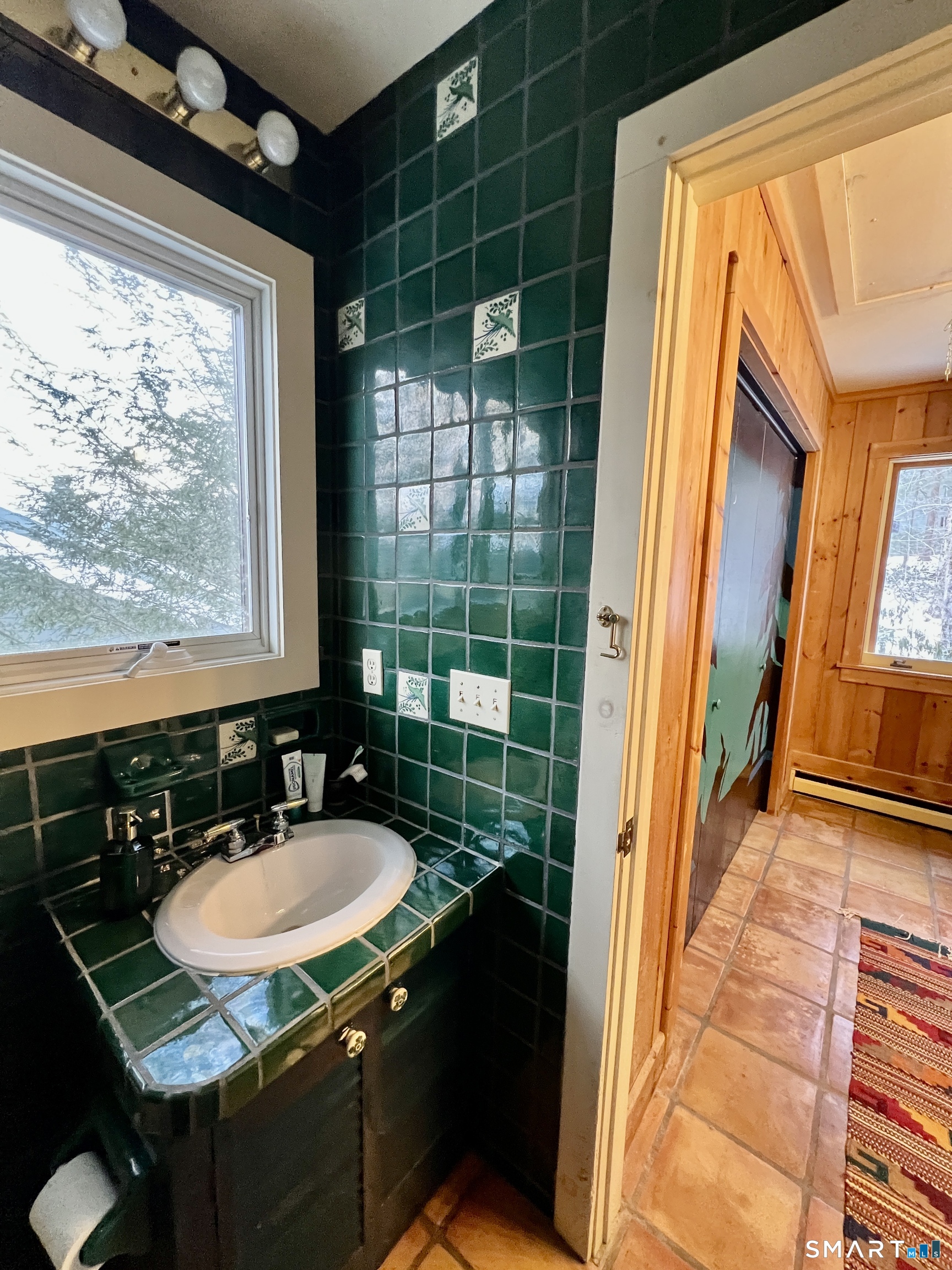290 Cliffside Drive Torrington, CT 06790 - Photo 28 of 40 a bathroom with a sink a vanity and a mirror