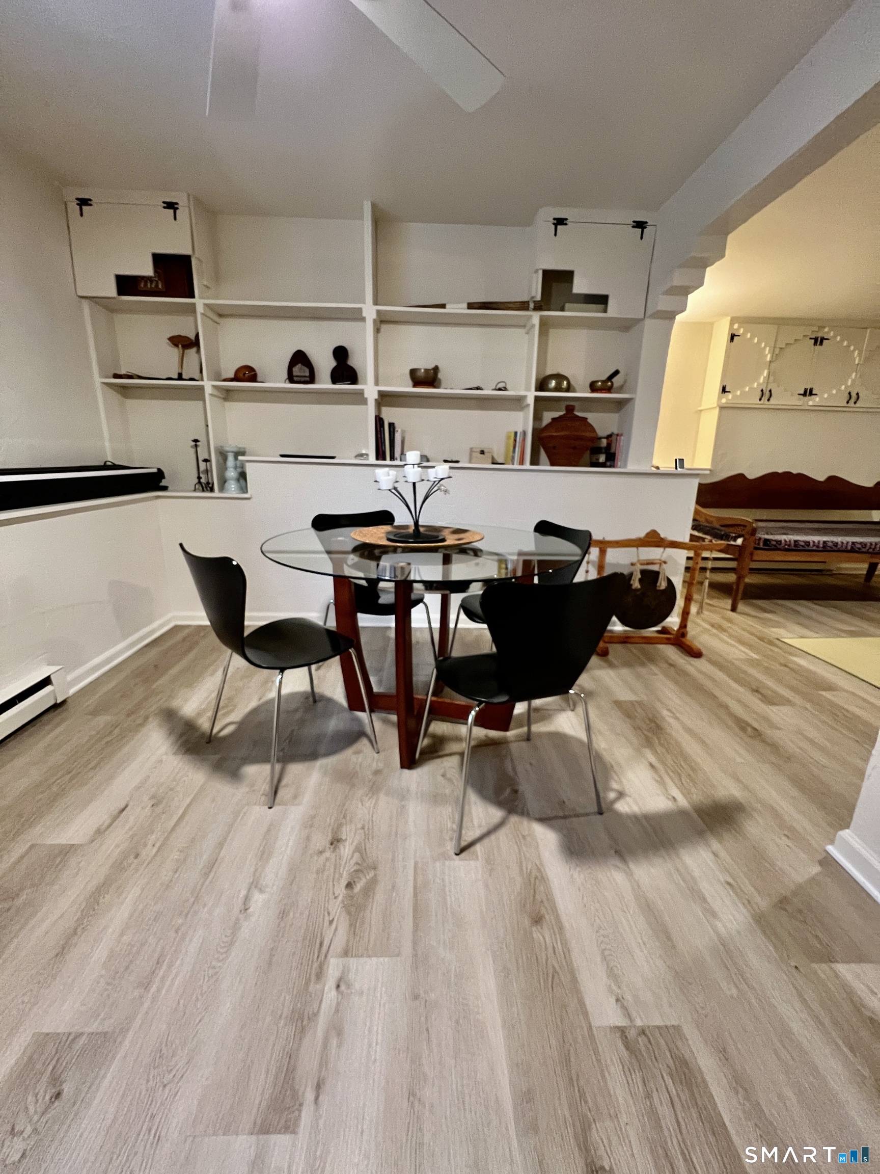 290 Cliffside Drive Torrington, CT 06790 - Photo 33 of 40 a view of a kitchen with dining room and wooden floor