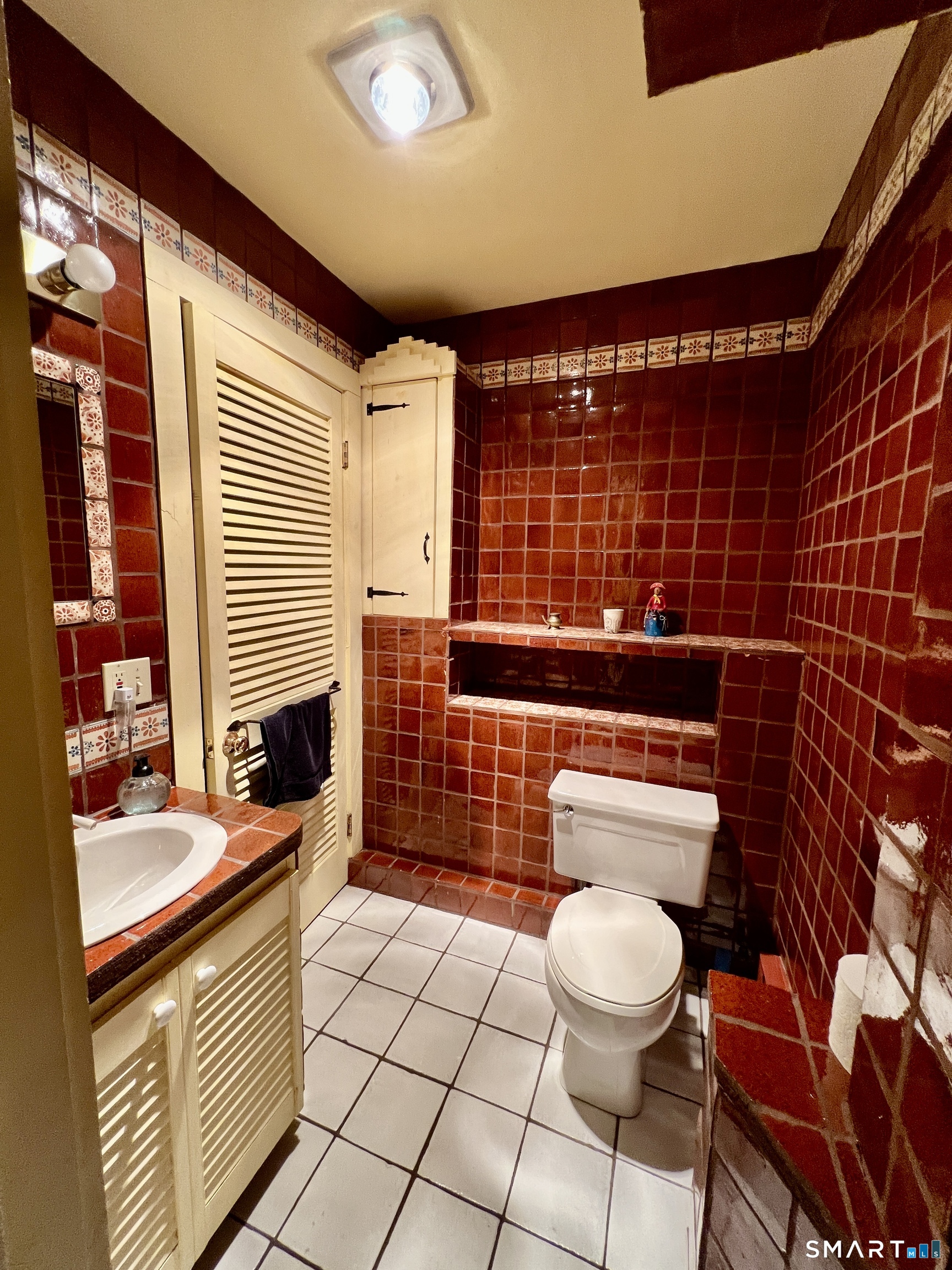 290 Cliffside Drive Torrington, CT 06790 - Photo 39 of 40 a bathroom with a sink a toilet and shower