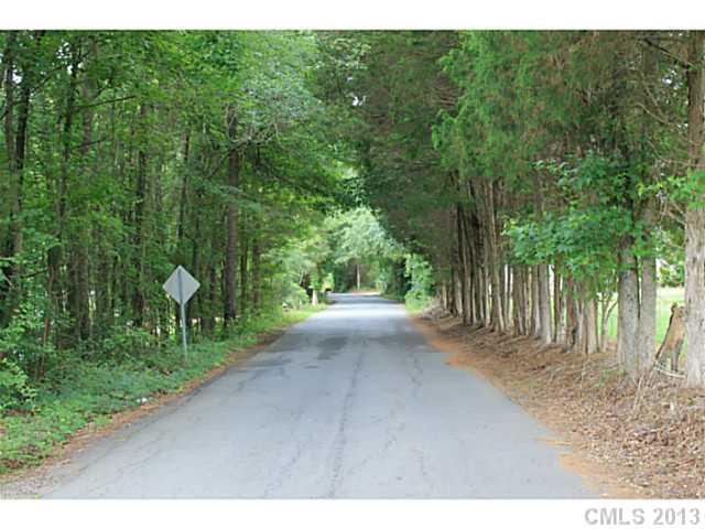 27 Sadlers Ridge Road, Unit 27 Indian Land, SC 29707 - Photo 1 of 11 a view of a yard with a tree