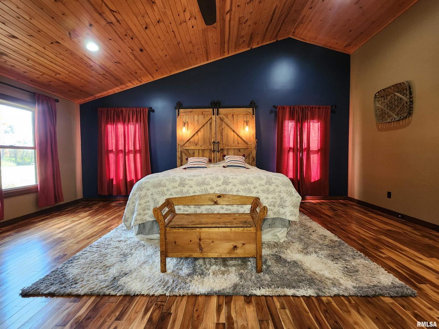 253 Ween Road De Soto, IL 62924 - Photo 12 of 56 a bed sitting in a spacious bedroom next to a window