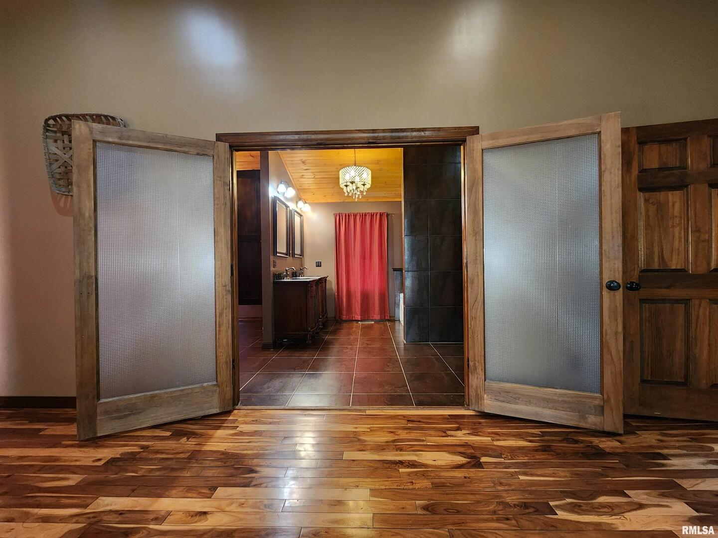 253 Ween Road De Soto, IL 62924 - Photo 14 of 56 an empty room with wooden floor closet and windows