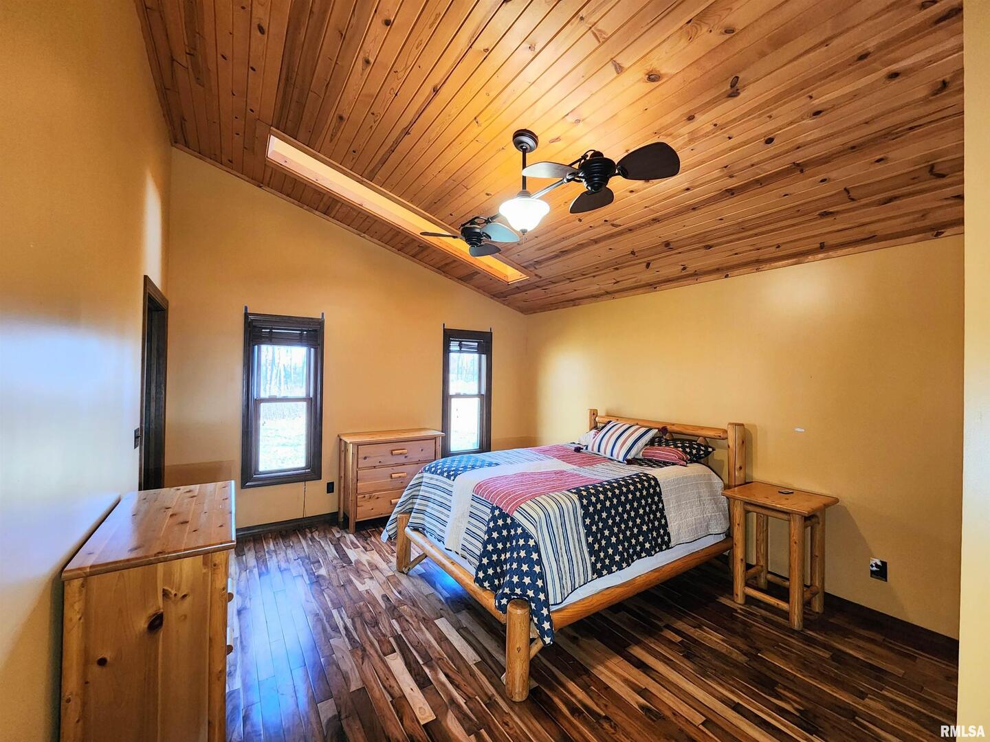 253 Ween Road De Soto, IL 62924 - Photo 19 of 56 a bedroom with a bed and wooden floor