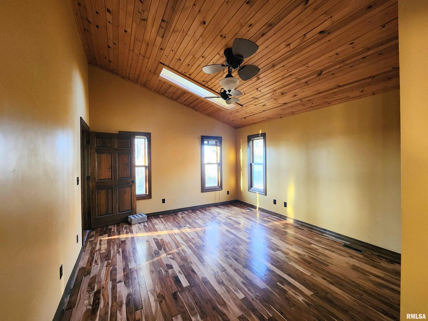 253 Ween Road De Soto, IL 62924 - Photo 24 of 56 a view of an empty room with wooden floor and a window