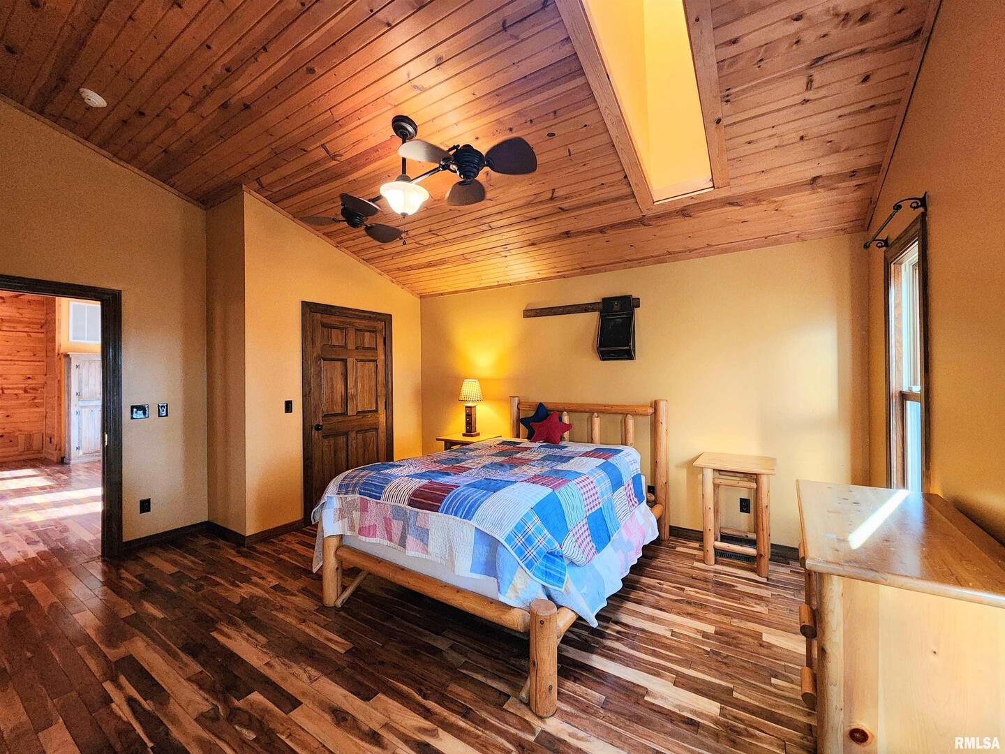 253 Ween Road De Soto, IL 62924 - Photo 27 of 56 a bedroom with bed and wooden floor