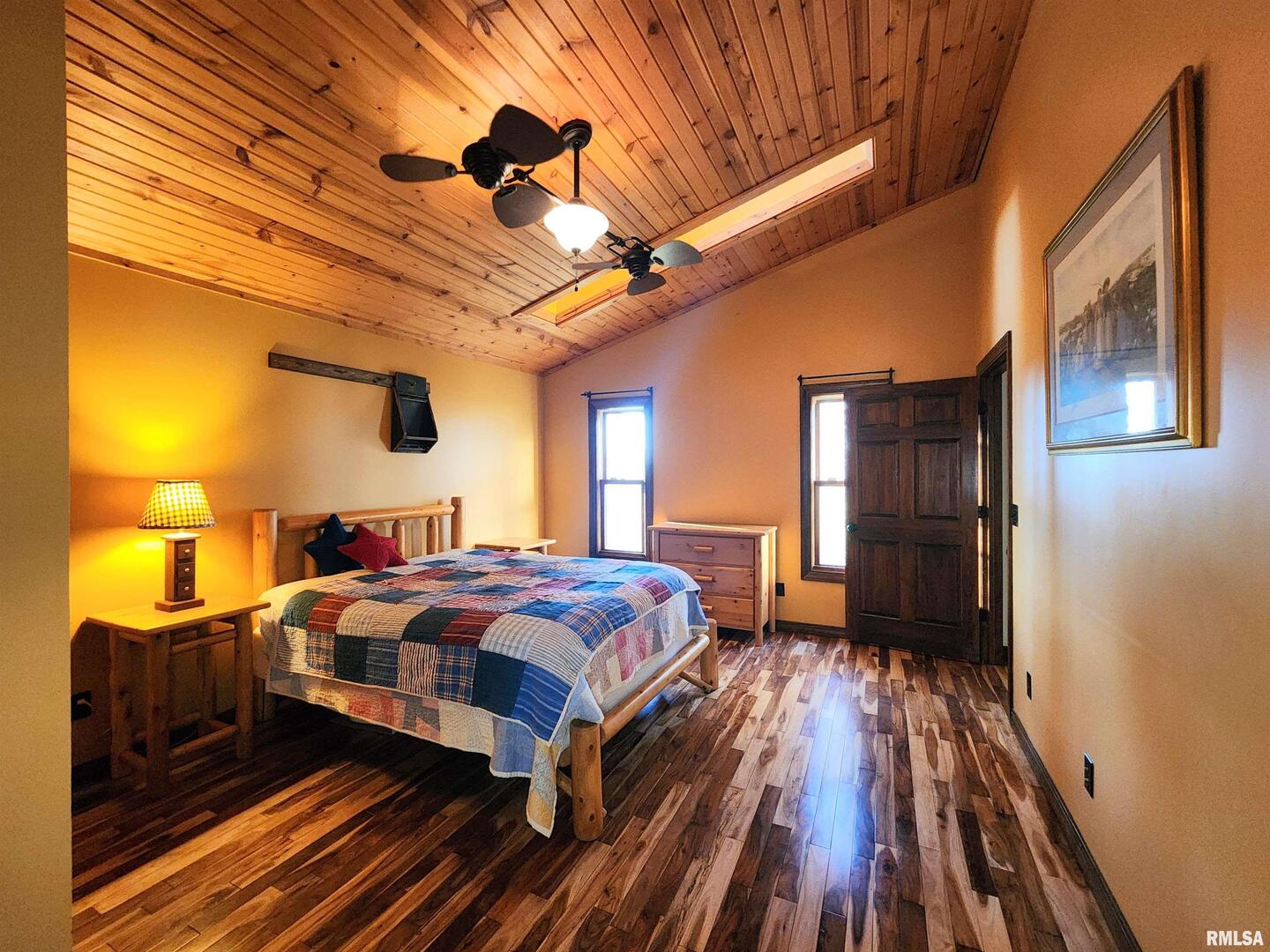 253 Ween Road De Soto, IL 62924 - Photo 28 of 56 a bedroom with a bed and wooden floor