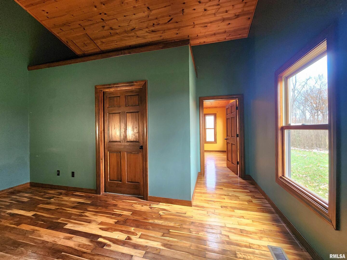 253 Ween Road De Soto, IL 62924 - Photo 53 of 56 a view of empty room with window and wooden floor