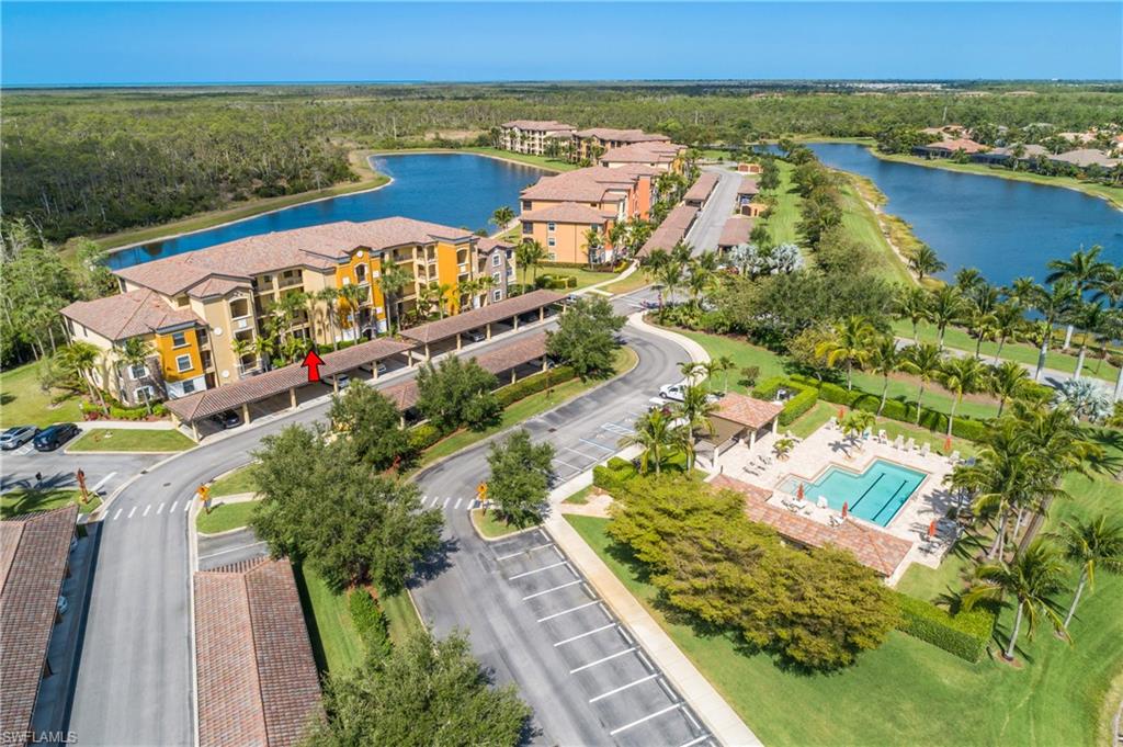 9719 Acqua Court, Unit 214 Naples, FL 34113 - Photo 31 of 50 a view of swimming pool with a balcony