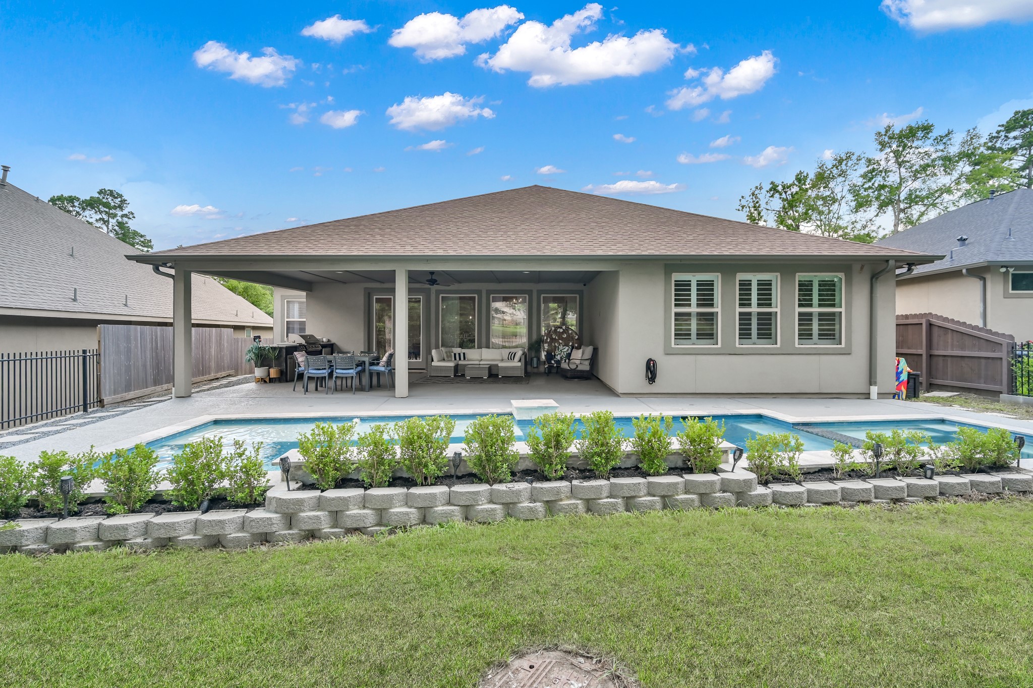 4792 West Fork Boulevard Conroe, TX 77304 - Photo 35 of 42 Beautiful landscaping, stones and pavers.