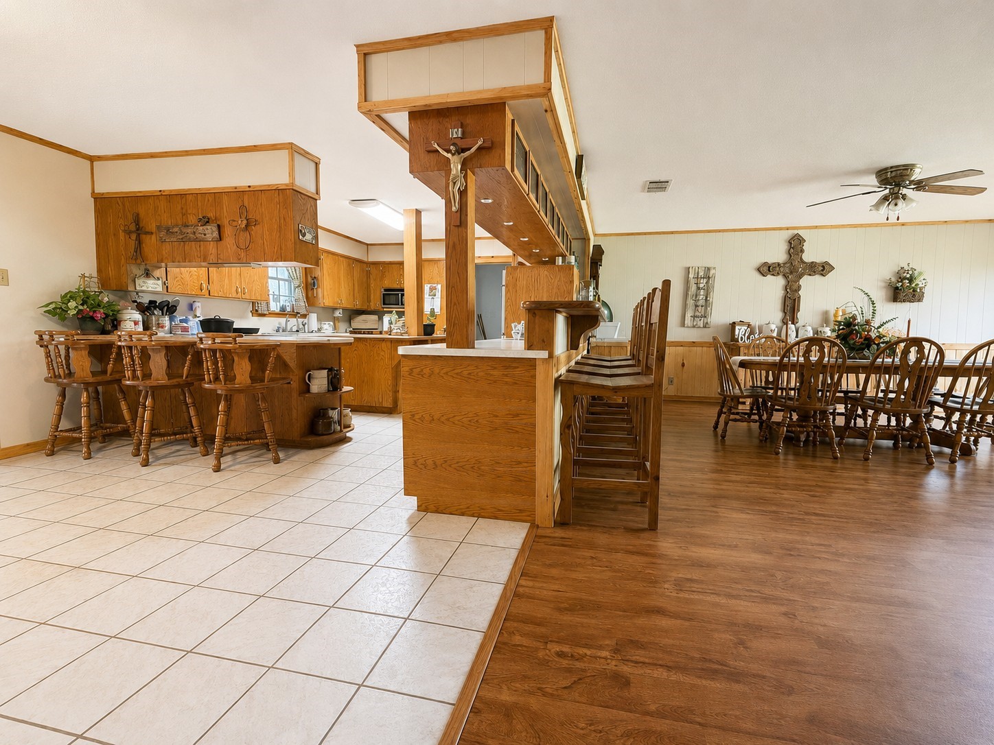 416 Division Street Jewett, TX 75846 - Photo 5 of 38 a living room with couches chairs and kitchen view with wooden floor