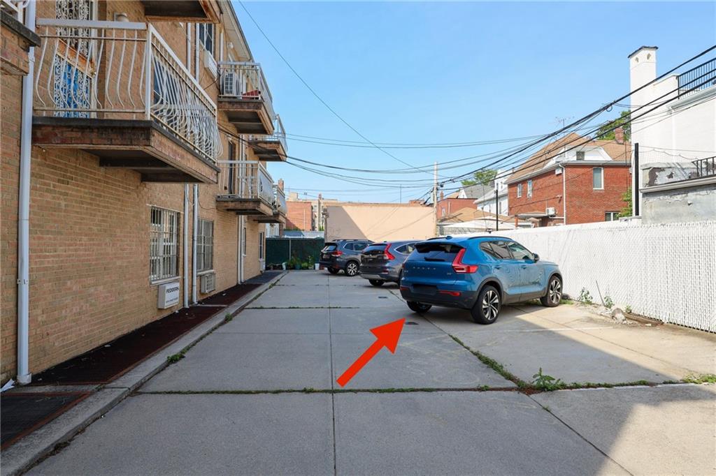 8657 Bay 16th Street, Unit 3B Brooklyn, NY 11214 - Photo 16 of 17 a car parked in front of a house