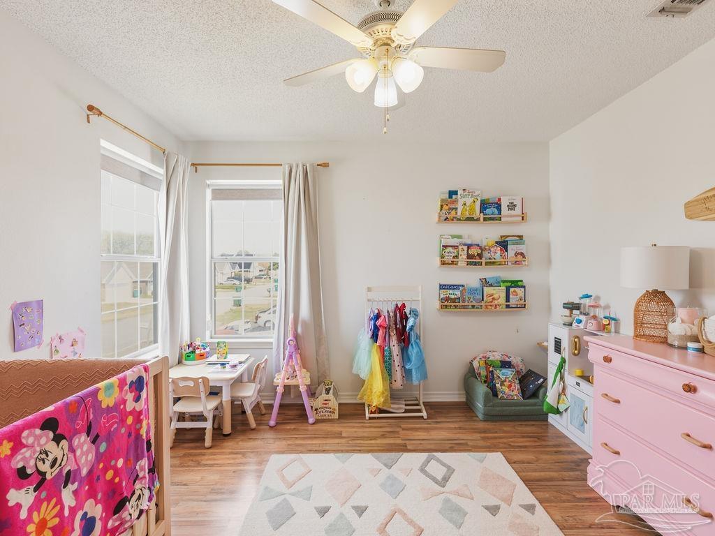 446 Sandy Ridge Circle Mary Esther, FL 32569 - Photo 17 of 26 a view of a workspace with furniture and a window