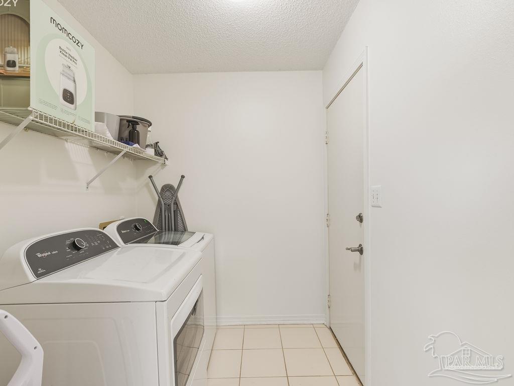 446 Sandy Ridge Circle Mary Esther, FL 32569 - Photo 24 of 26 a utility room with dryer and washer