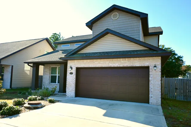 a front view of a house with yard