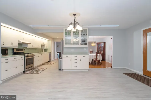 a view of a kitchen with cabinets