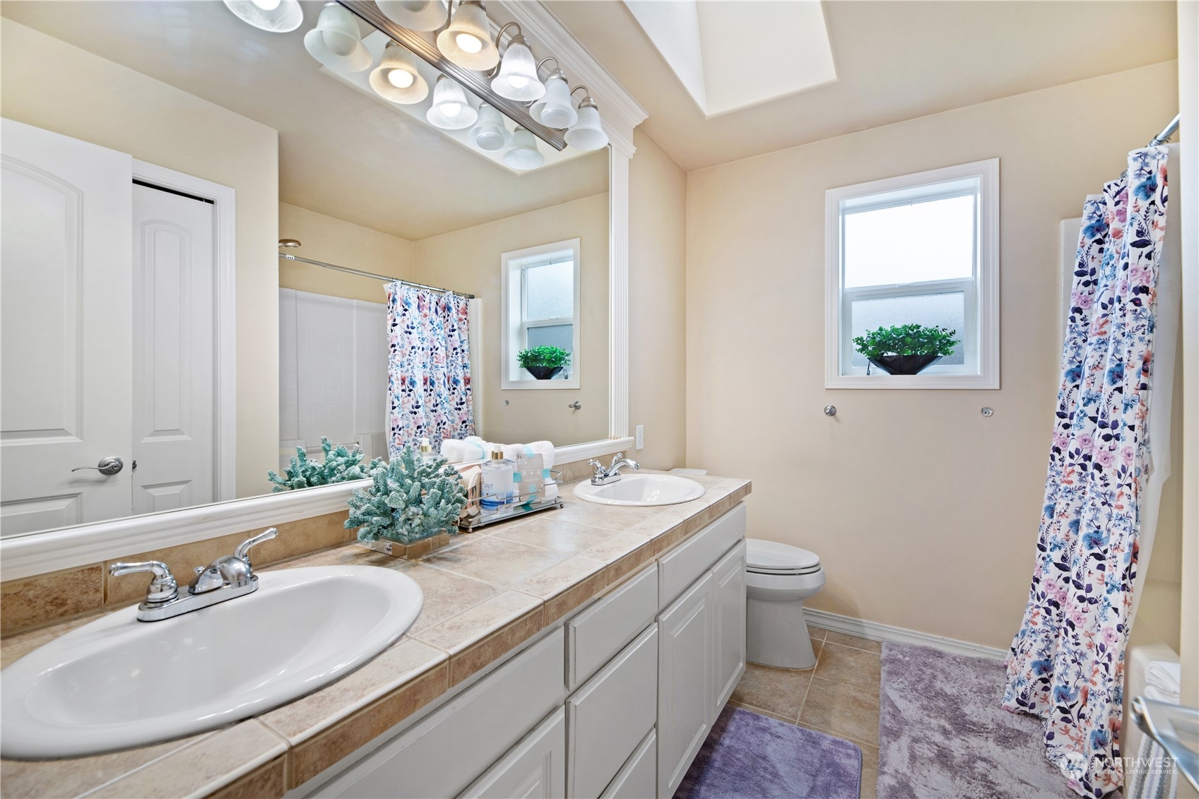 3521 214th Place Southeast Bothell, WA 98021 - Photo 26 of 35 a bathroom with a granite countertop double vanity sink mirror and toilet