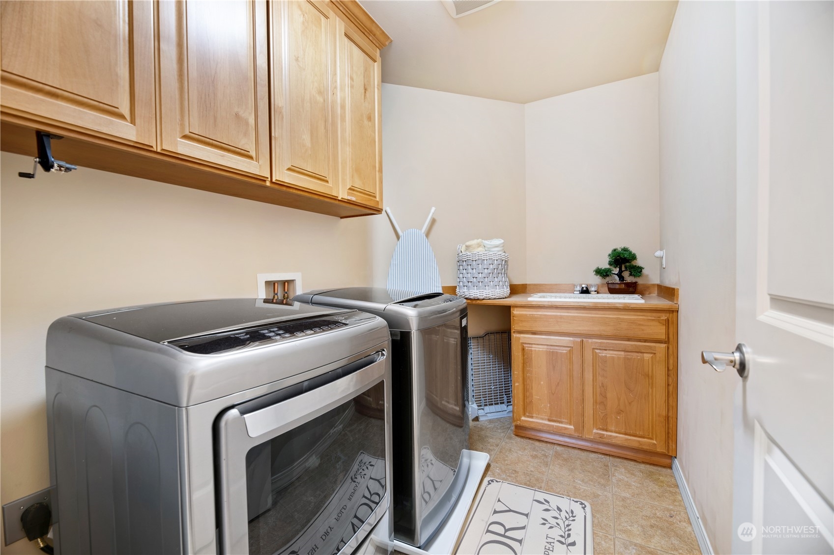 3521 214th Place Southeast Bothell, WA 98021 - Photo 27 of 35 a utility room with sink dryer and washer